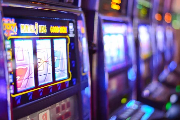 Mobile phone displaying litetoto account balance and live dealer table